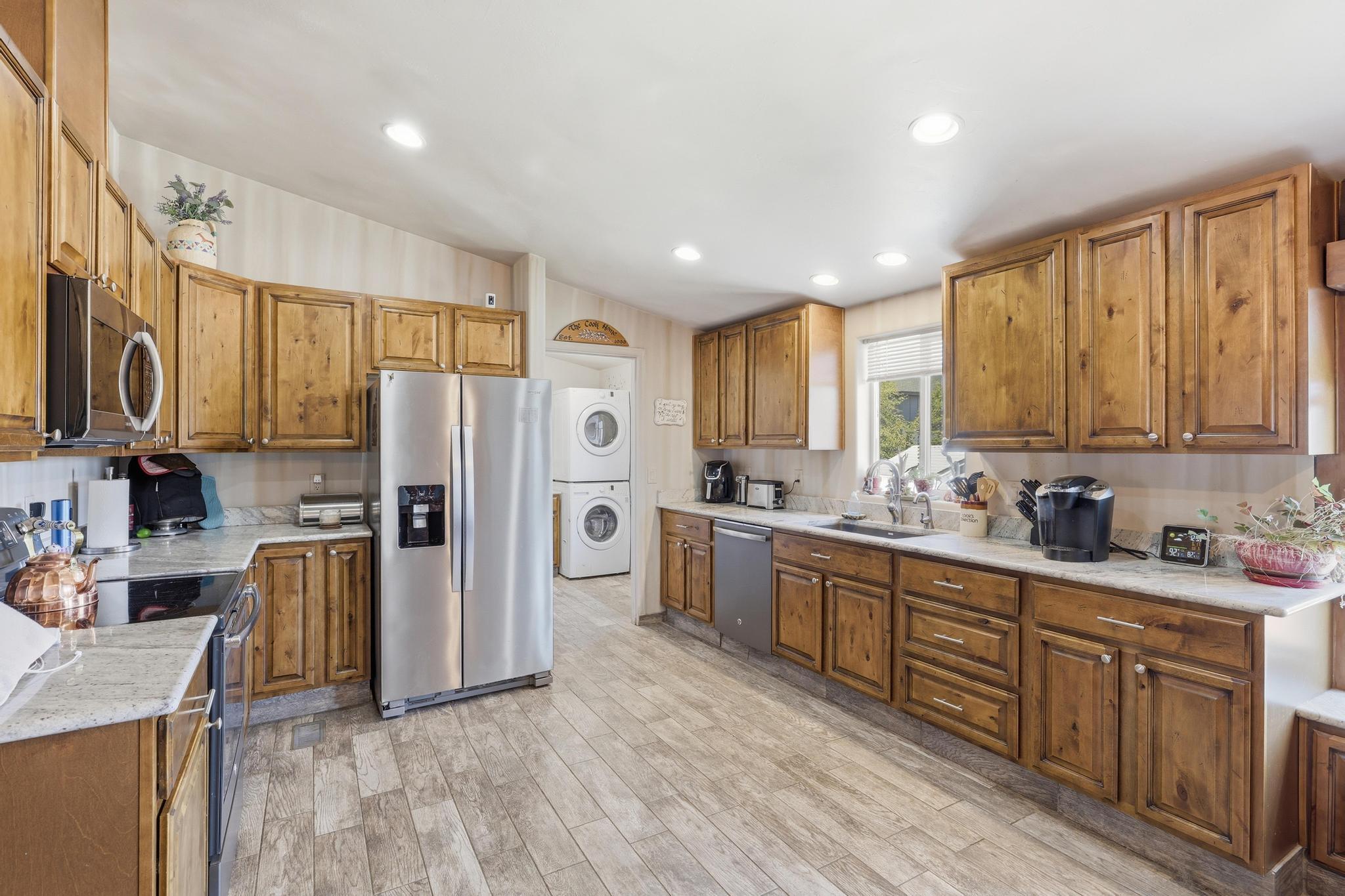 1211 Heather Circle Payson, AZ 85541 - Photo 10 of 51 a kitchen with refrigerator cabinets and furniture