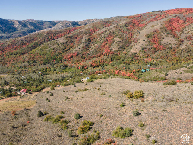 3378 Spring Way, Unit 410 Huntsville, UT 84317 - Photo 4 of 24 Expansive mountainous terrain featuring scattered trees and brush