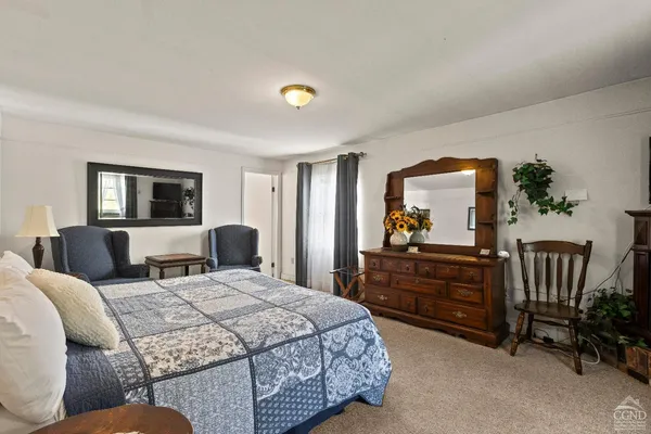 a bathroom with a sink a toilet and a bathtub