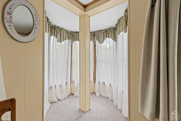 a view of balcony with wooden floor and outdoor space