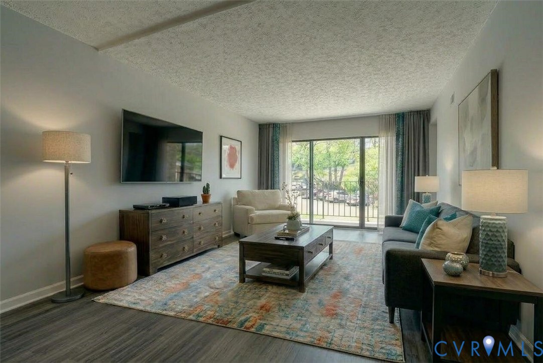 1501 Bronwyn Road, Unit 202 Henrico, VA 23238 - Photo 3 of 22 a living room with furniture and a flat screen tv