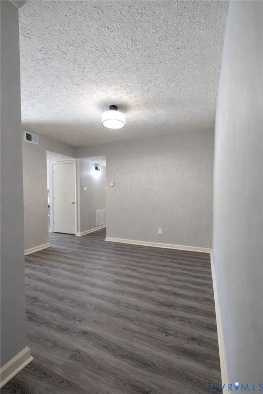 1501 Bronwyn Road, Unit 202 Henrico, VA 23238 - Photo 4 of 22 a view of an empty room with wooden floor