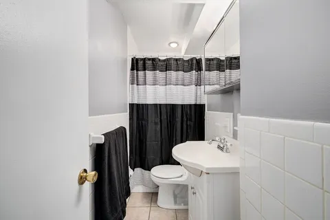 a bathroom with a sink and a toilet