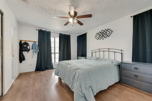 a kitchen with cabinets and stainless steel appliances