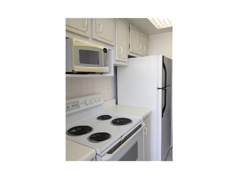 1150 East Sample Road, Unit 109A Pompano Beach, FL 33064 - Photo 4 of 9 Exterior Front