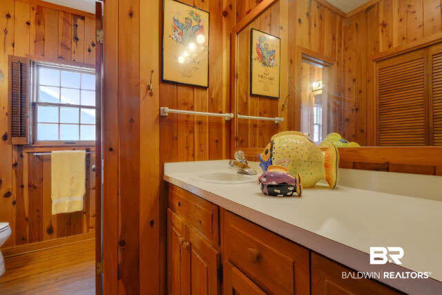 30234 River Road Orange Beach, AL 36561 - Photo 11 of 23 Second bath between bedrooms 2 & 3 has two separate vanities.