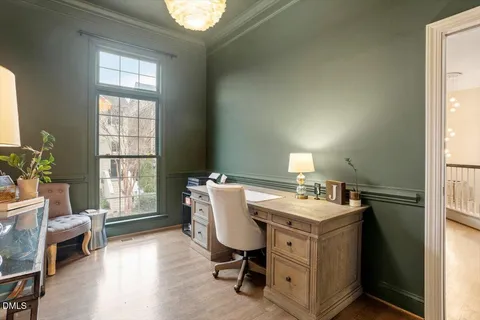 a kitchen with a stove a sink and a refrigerator