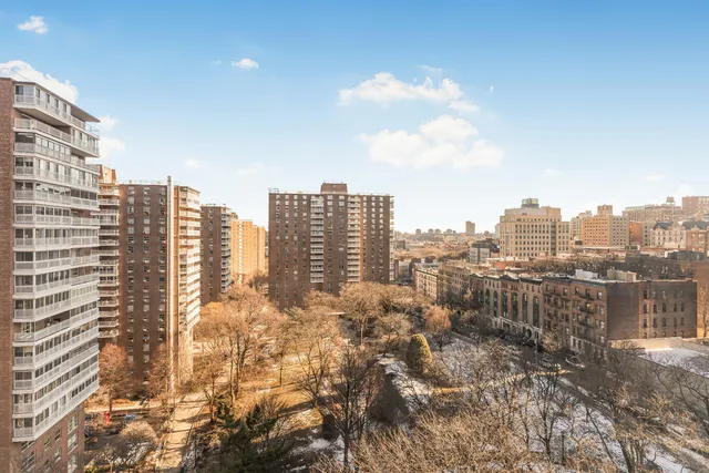 a view of a city with tall buildings