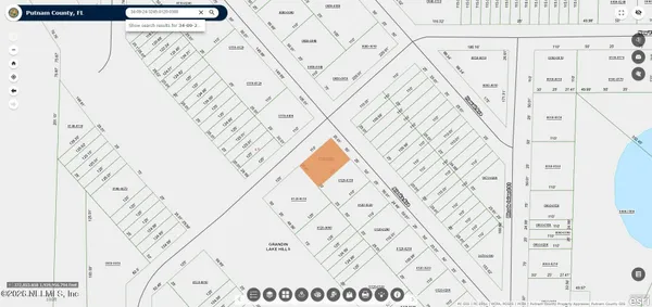 a view of a yard with trees