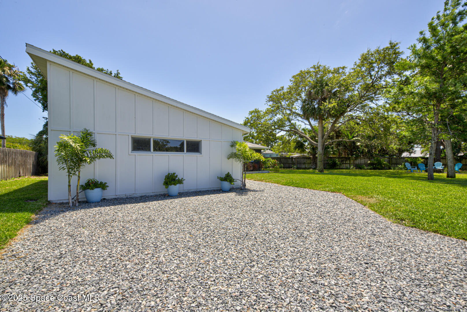 911 Bali Road Cocoa Beach, FL 32931 - Photo 29 of 66 front of house left