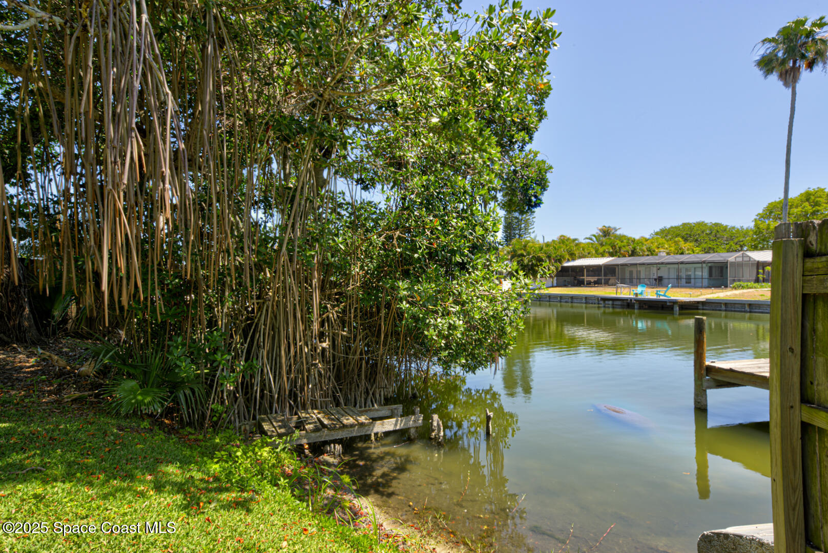 911 Bali Road Cocoa Beach, FL 32931 - Photo 7 of 66 a view of swimming pool with a patio