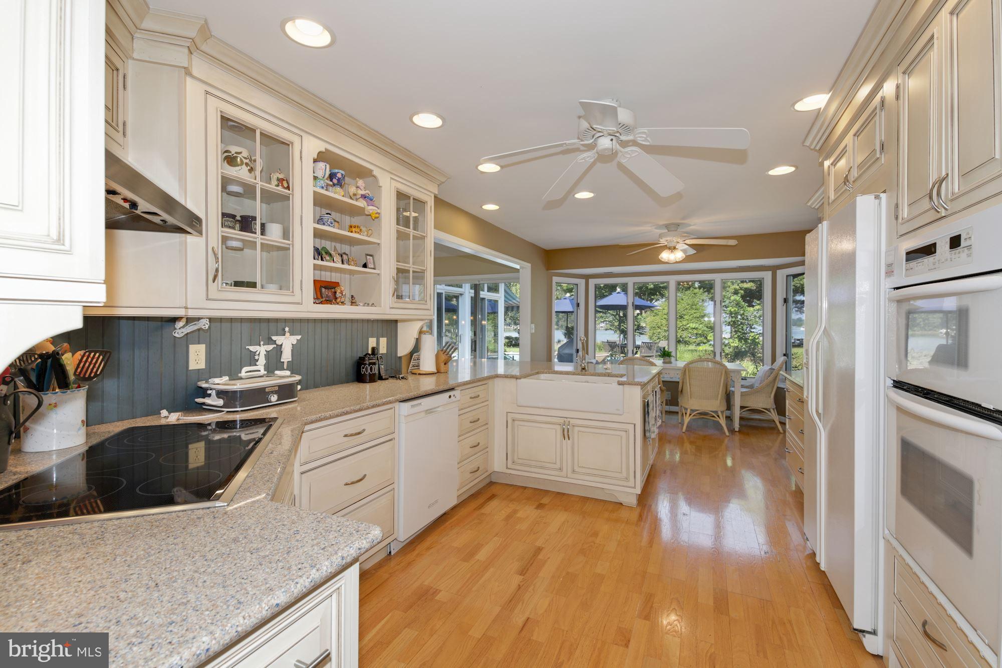 5562 Heron Point Road Royal Oak, MD 21662 - Photo 19 of 60 kitchen w/casual dining overlooking Irish creek