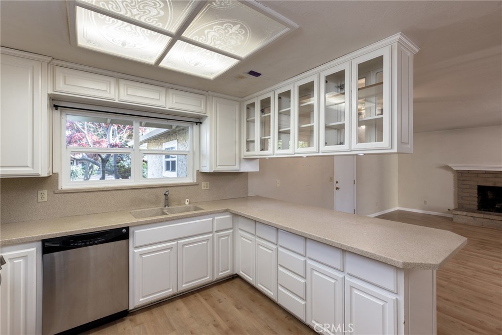 44 Forest Creek Circle Chico, CA 95928 - Photo 7 of 21 a kitchen with a sink cabinets and window