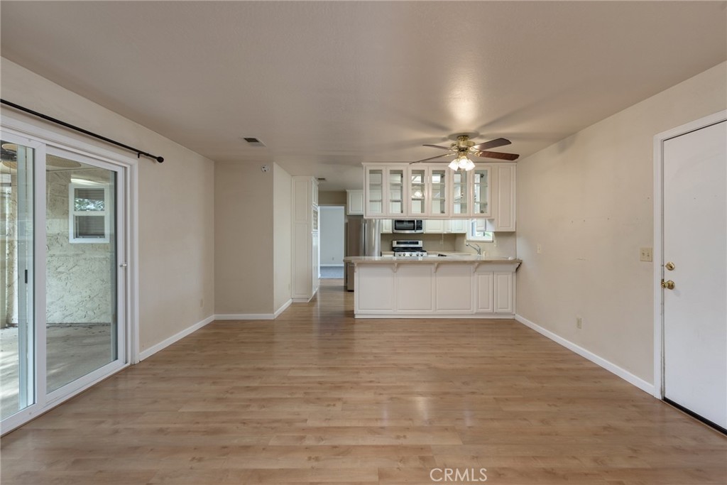 44 Forest Creek Circle Chico, CA 95928 - Photo 9 of 21 a view of kitchen with refrigerator and window