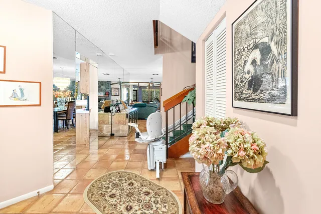 a view of a hallway with front door