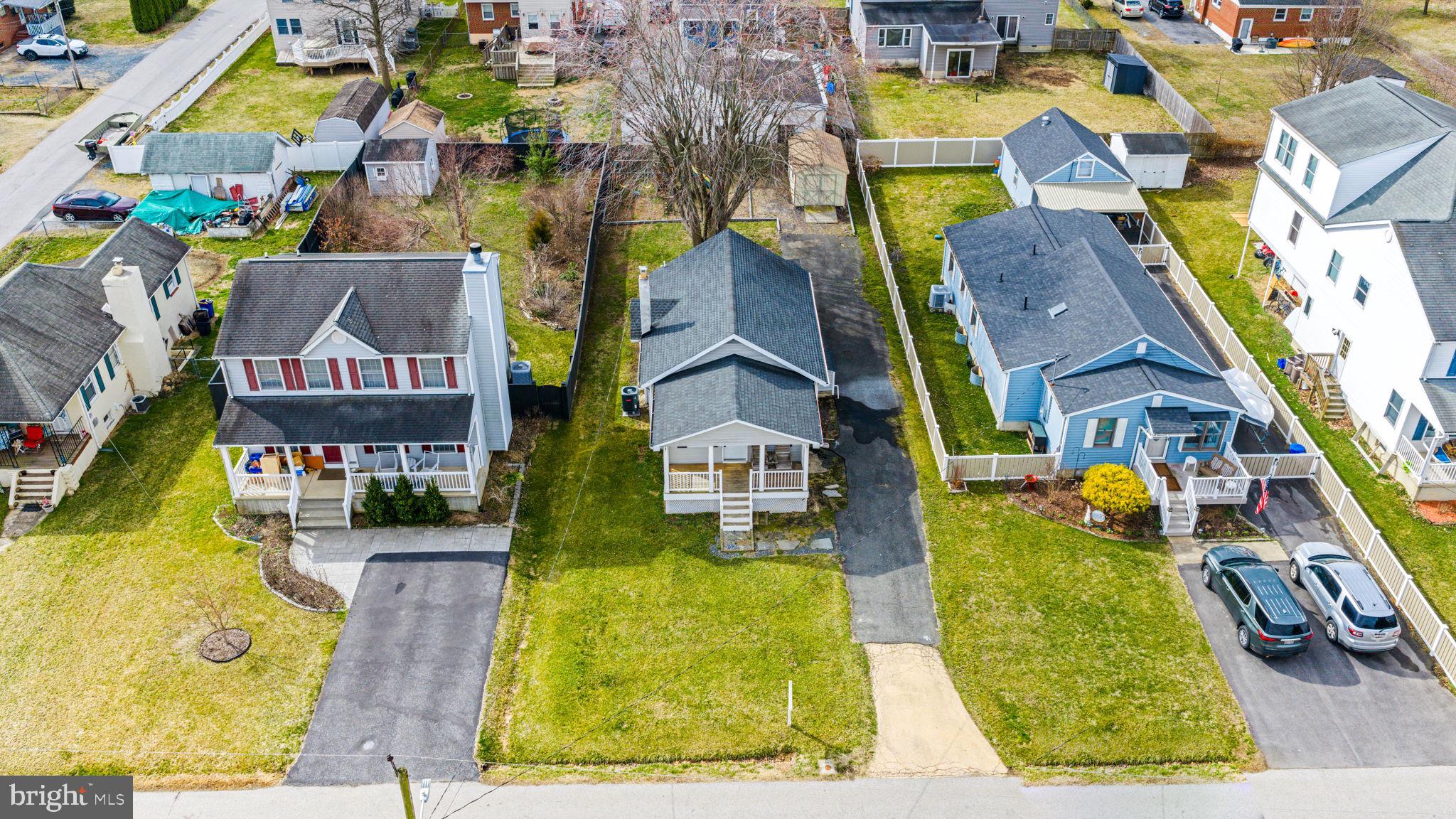 7343 Greenbank Road Baltimore, MD 21220 - Photo 2 of 46 an aerial view of residential houses with outdoor space