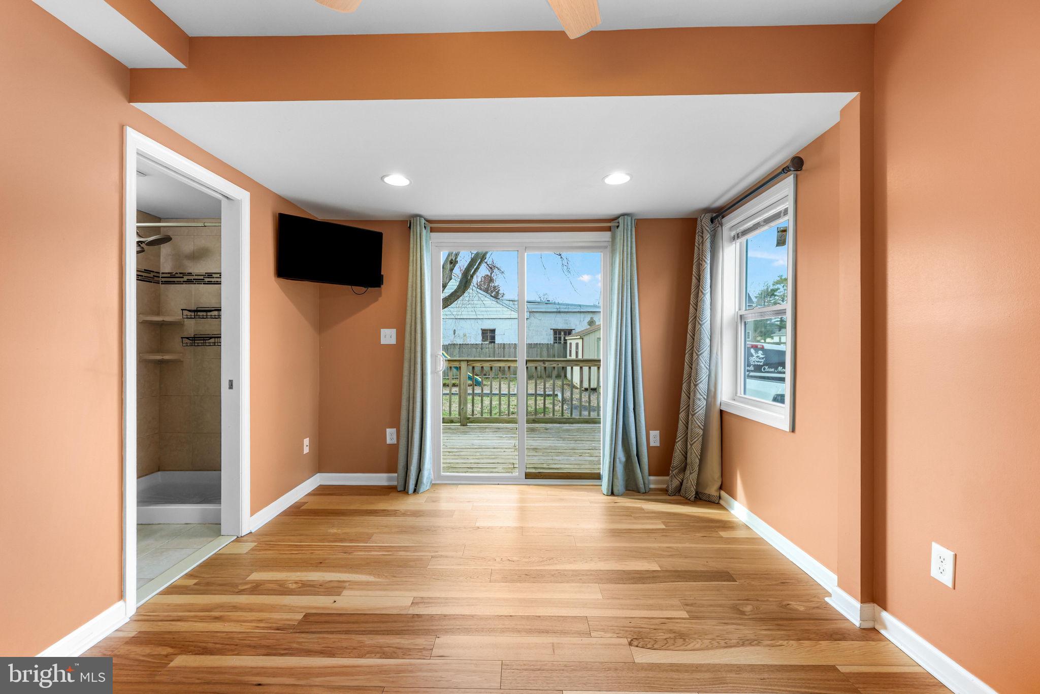 7343 Greenbank Road Baltimore, MD 21220 - Photo 24 of 46 a view of a hallway with wooden floor and closet