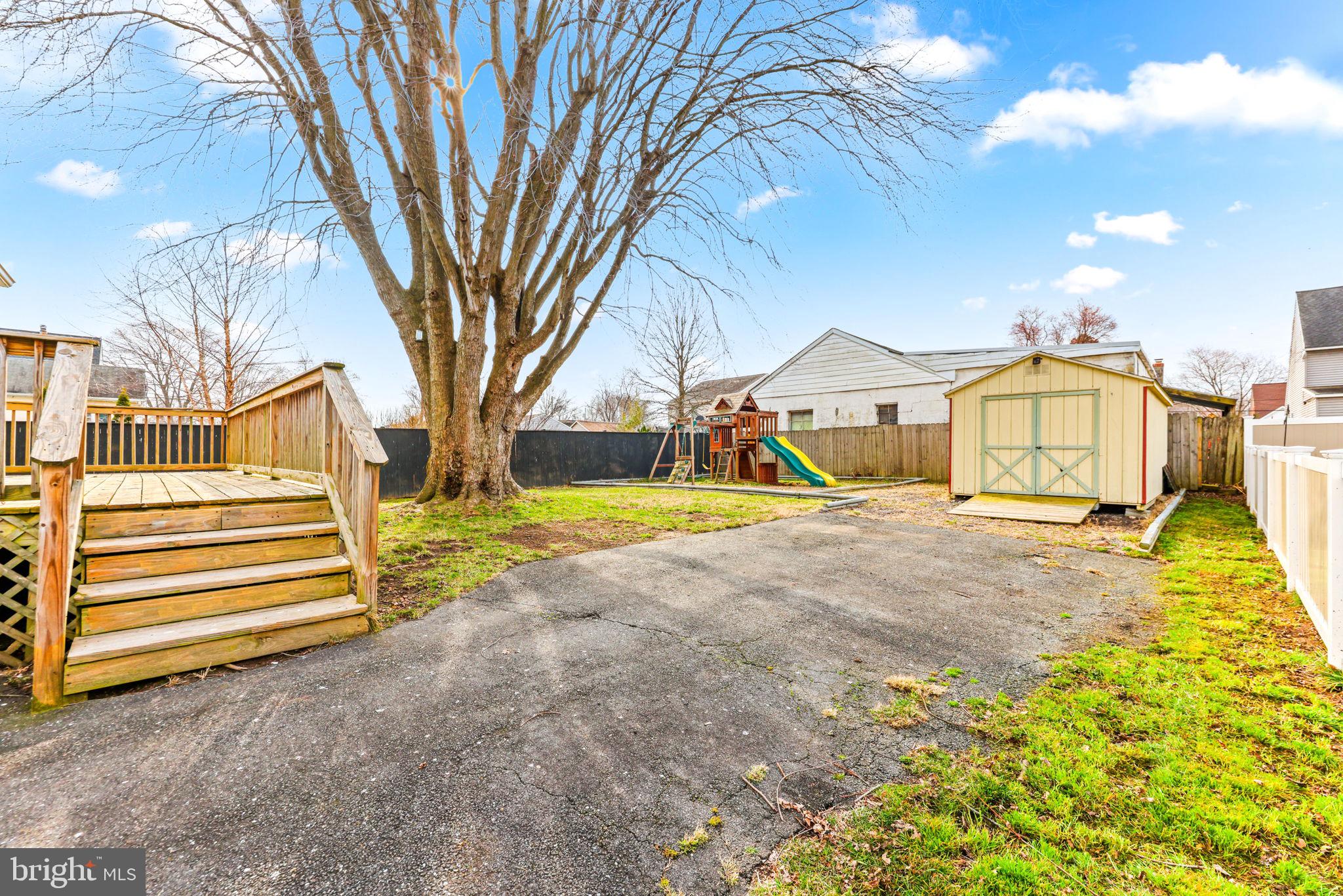 7343 Greenbank Road Baltimore, MD 21220 - Photo 35 of 46 a view of a house with a yard