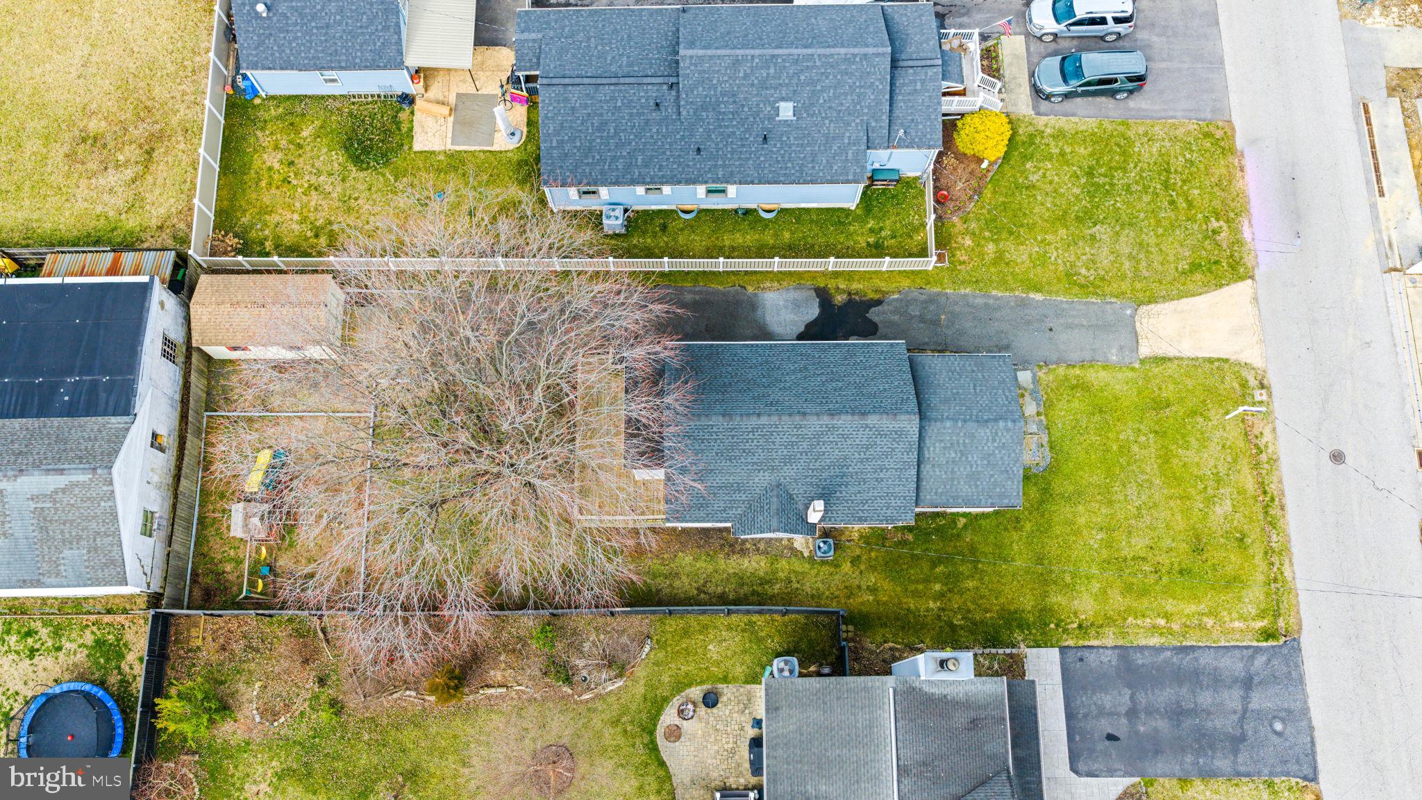 7343 Greenbank Road Baltimore, MD 21220 - Photo 36 of 46 an aerial view of a house with a swimming pool