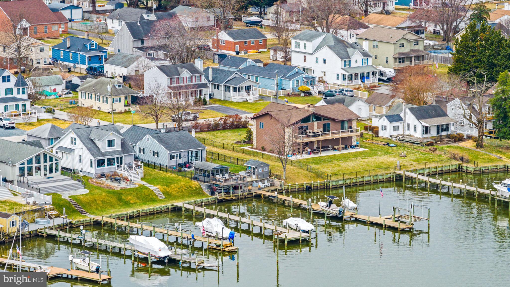 7343 Greenbank Road Baltimore, MD 21220 - Photo 42 of 46 an aerial view of residential houses with outdoor space and swimming pool