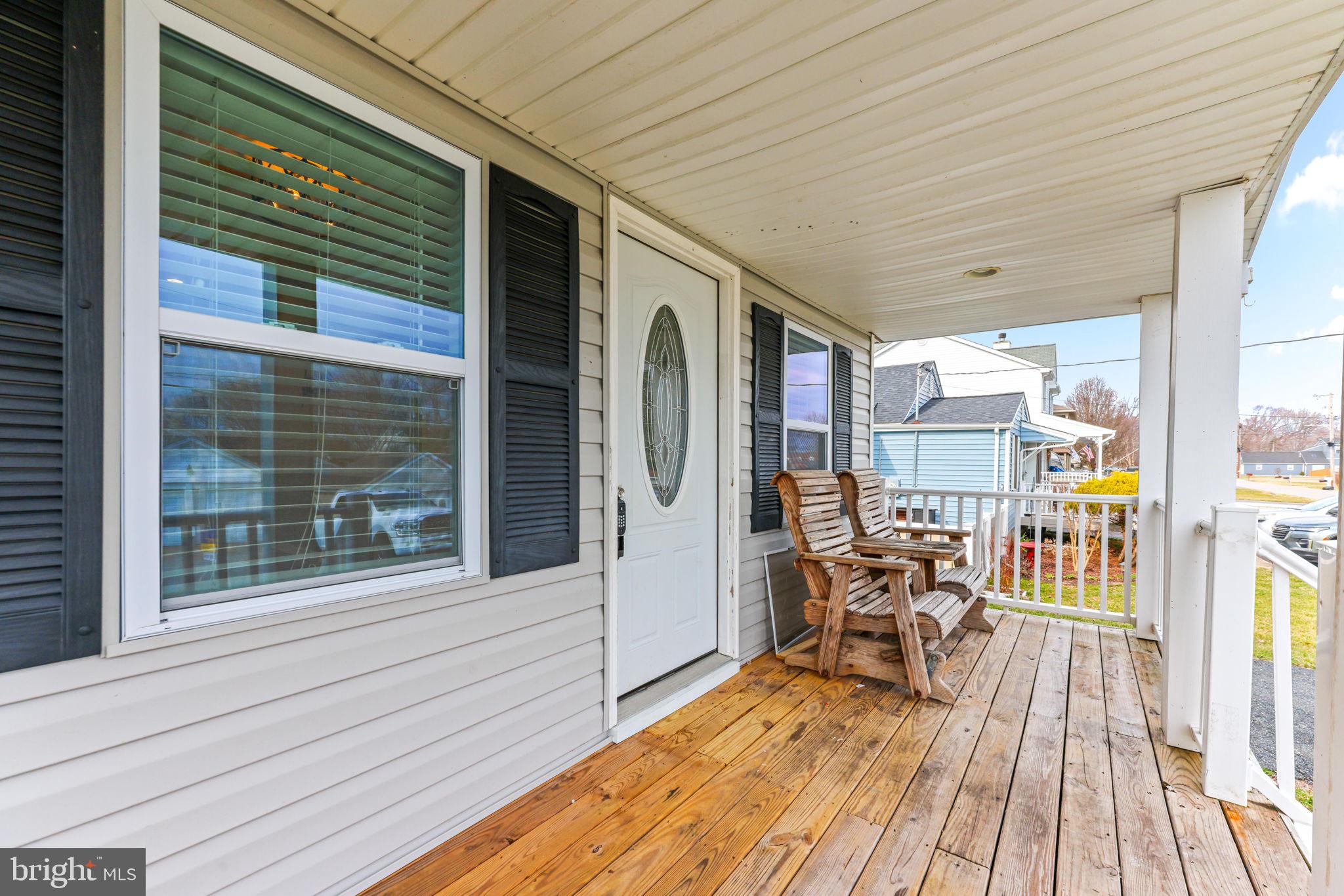 7343 Greenbank Road Baltimore, MD 21220 - Photo 6 of 46 a view of a chairs and table in the balcony