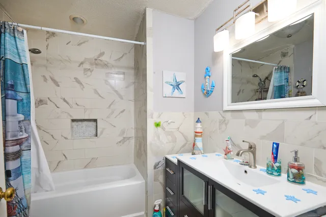 a view of a livingroom with furniture and window