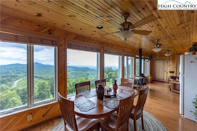 a bathroom with a shower curtain and a toilet