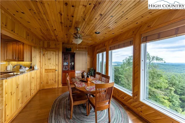 a view of a balcony with furniture