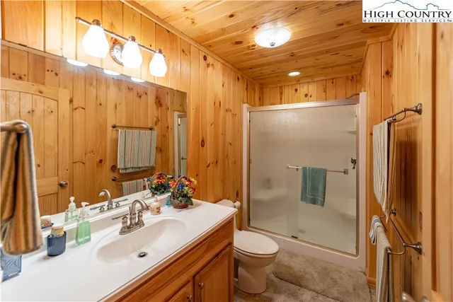 a view of a hallway with washer and dryer