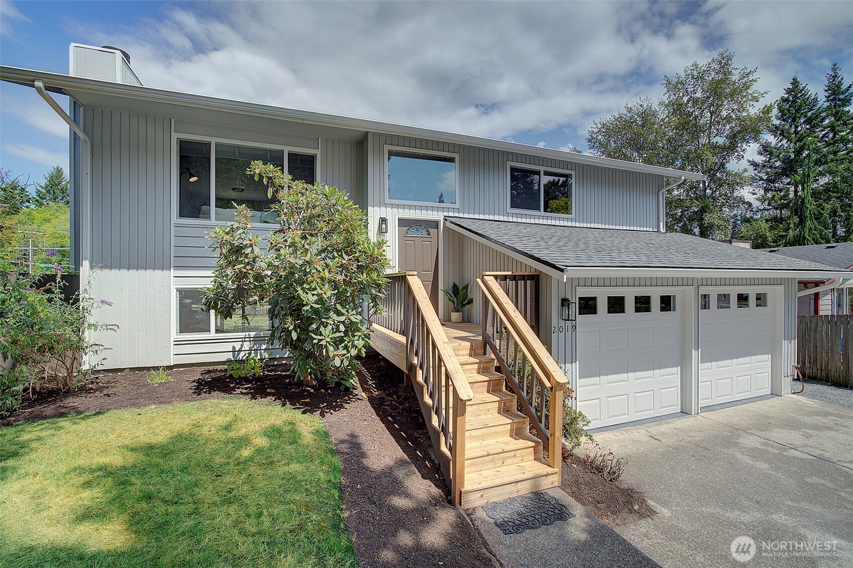 2019 181st Street Southeast Bothell, WA 98012 - Photo 1 of 23 front view of house with a yard