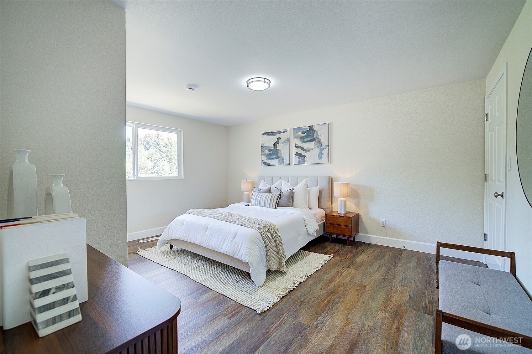2019 181st Street Southeast Bothell, WA 98012 - Photo 11 of 23 a bedroom with a bed and a desk