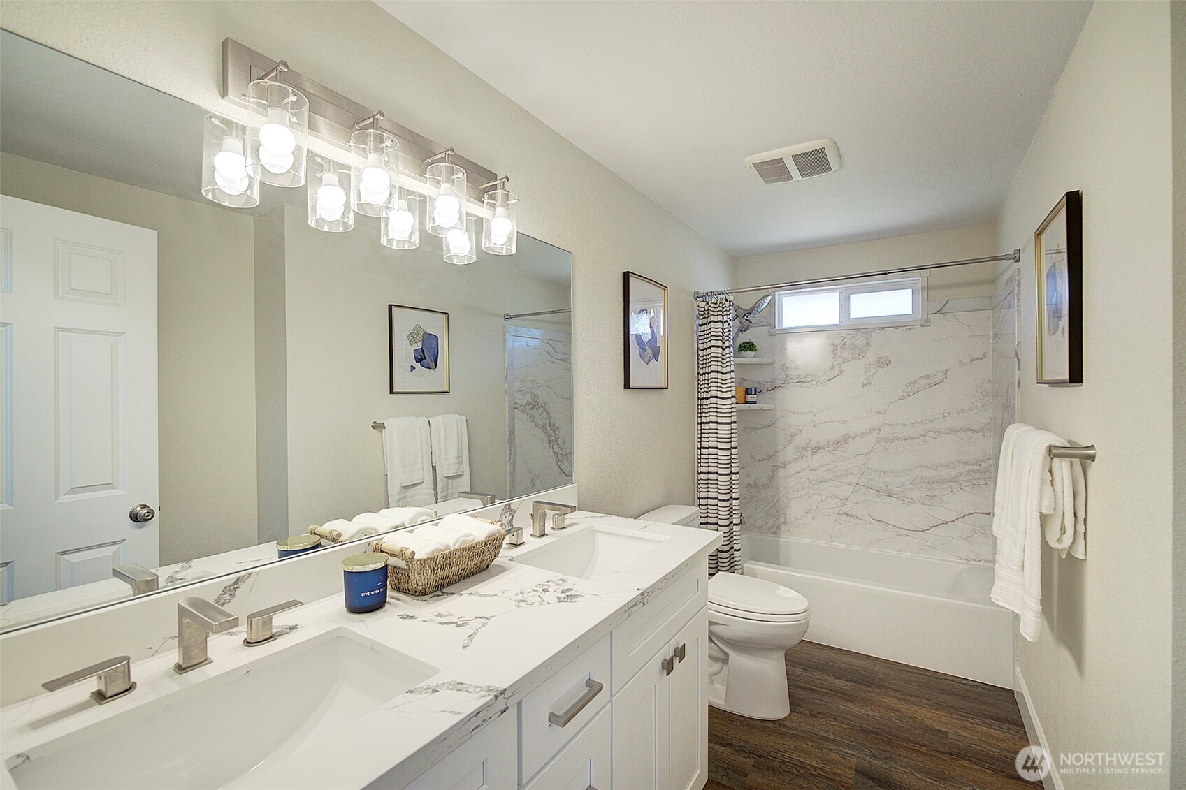 2019 181st Street Southeast Bothell, WA 98012 - Photo 12 of 23 a bathroom with a sink a toilet and shower