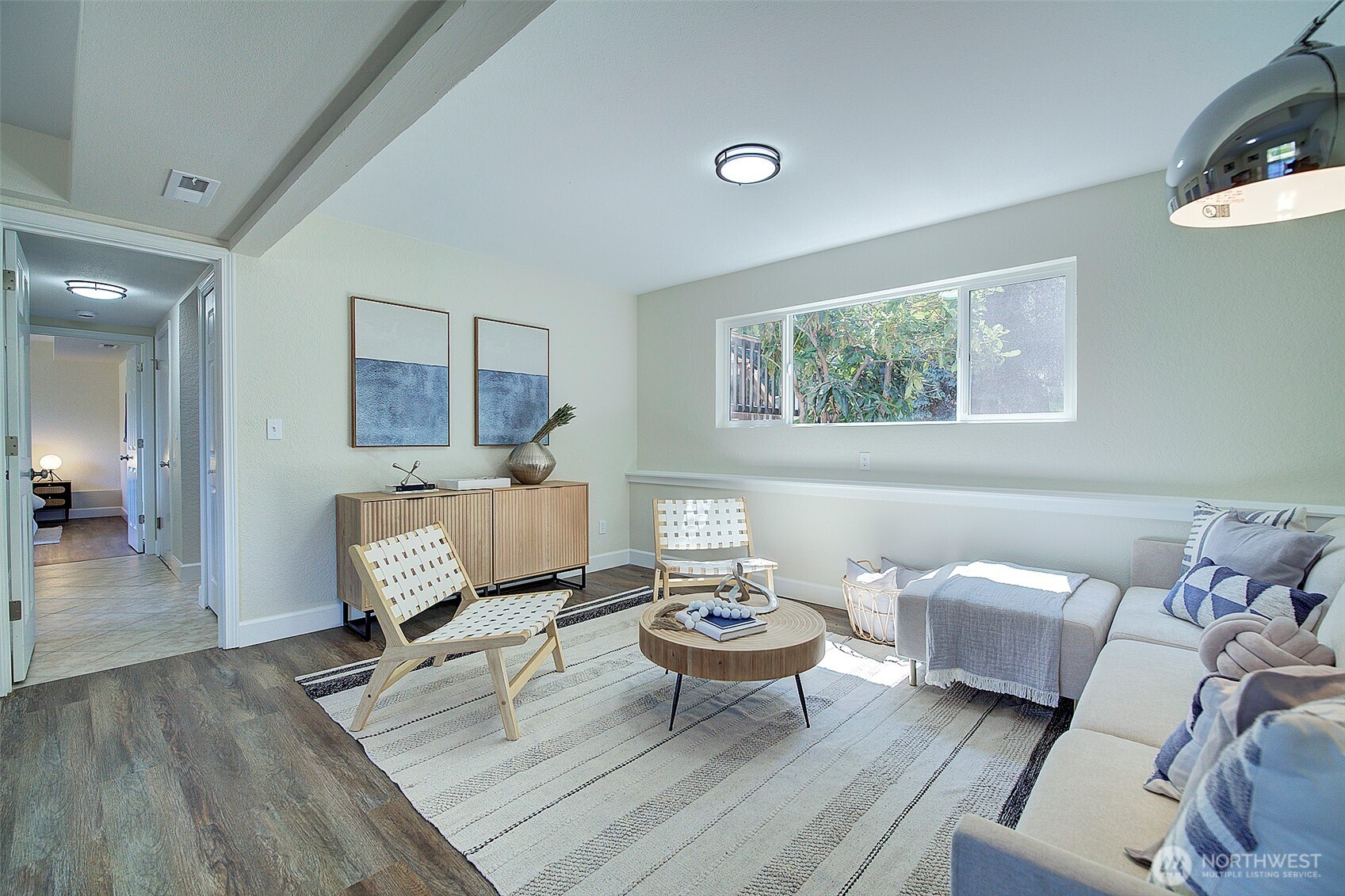 2019 181st Street Southeast Bothell, WA 98012 - Photo 14 of 23 a living room with furniture a rug and a table