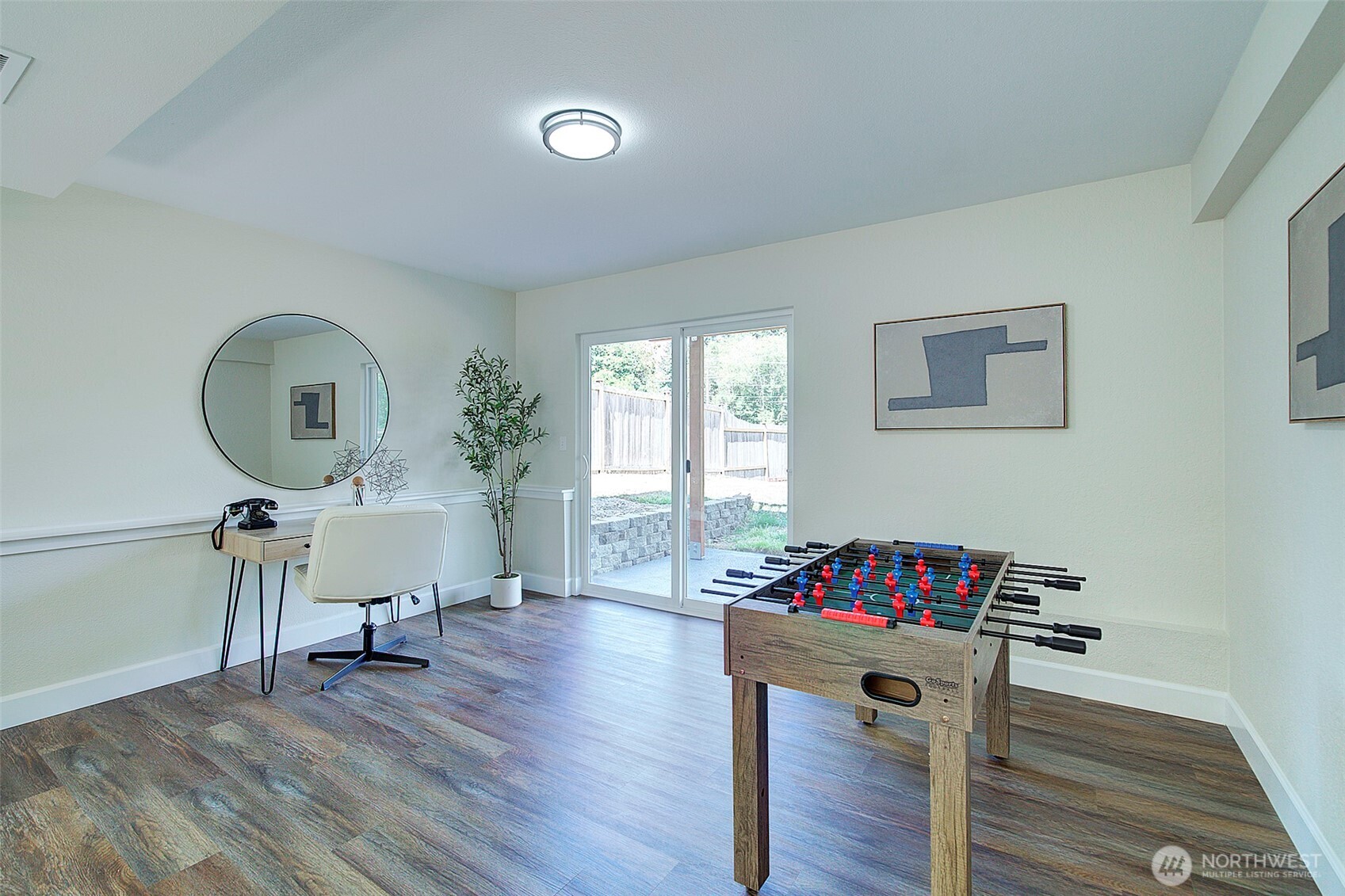 2019 181st Street Southeast Bothell, WA 98012 - Photo 15 of 23 a view of a livingroom with furniture hardwood floor and a workspace