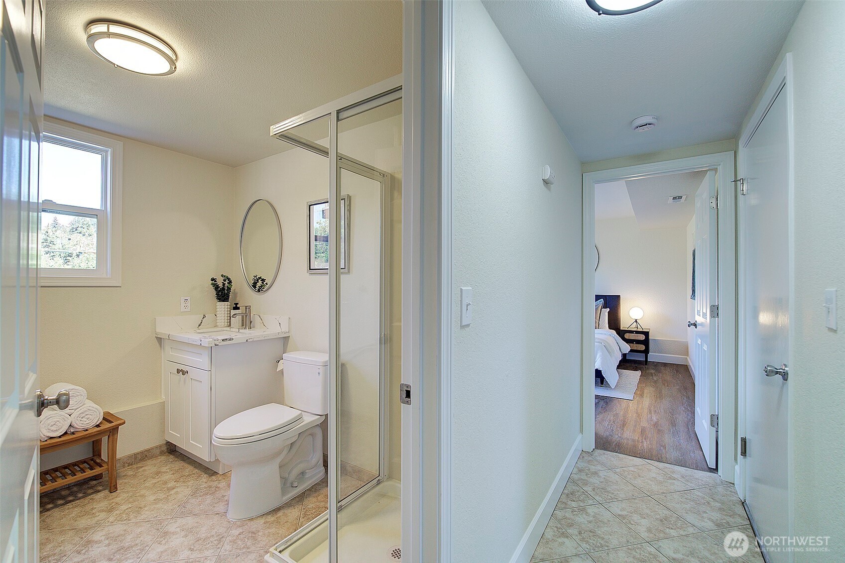 2019 181st Street Southeast Bothell, WA 98012 - Photo 18 of 23 a bathroom with a toilet a sink and mirror