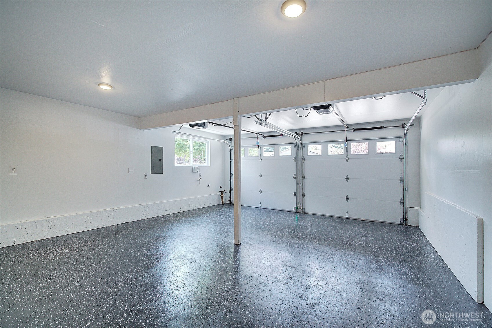 2019 181st Street Southeast Bothell, WA 98012 - Photo 19 of 23 an empty room with a empty space and windows