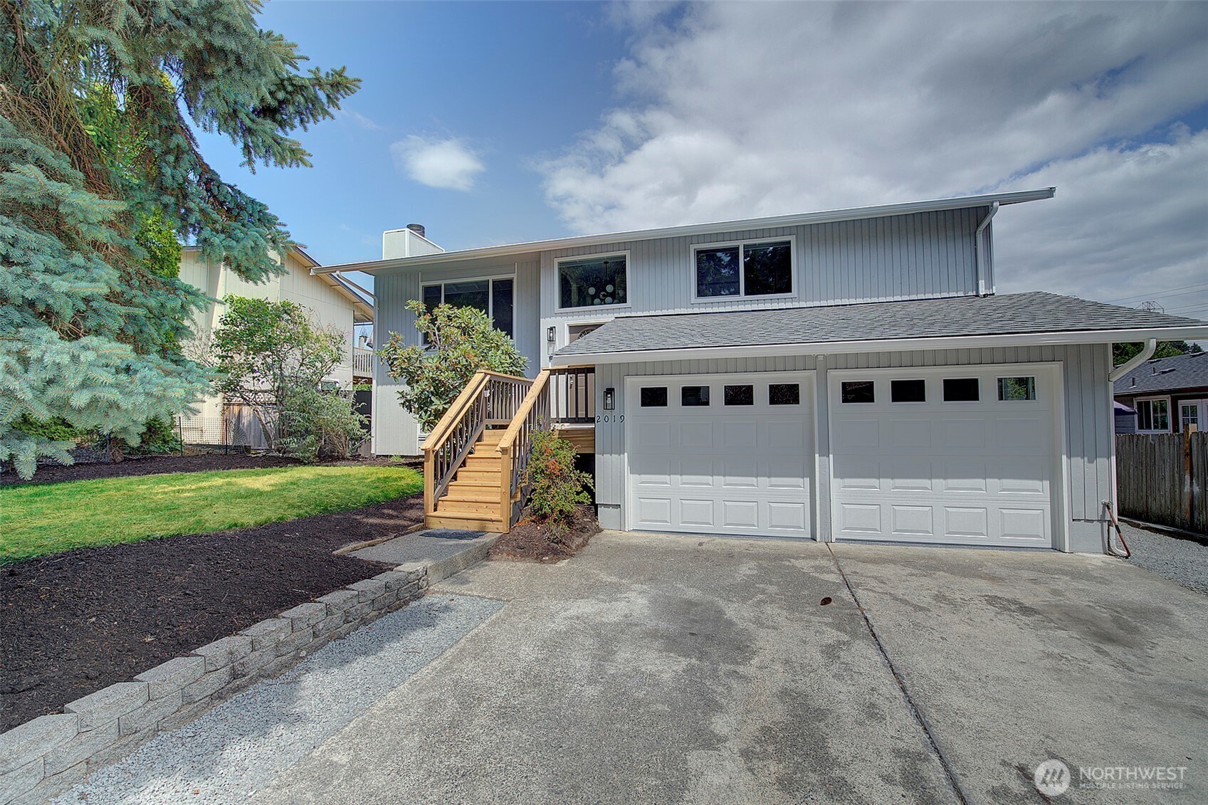 2019 181st Street Southeast Bothell, WA 98012 - Photo 2 of 23 a view of a house with a park