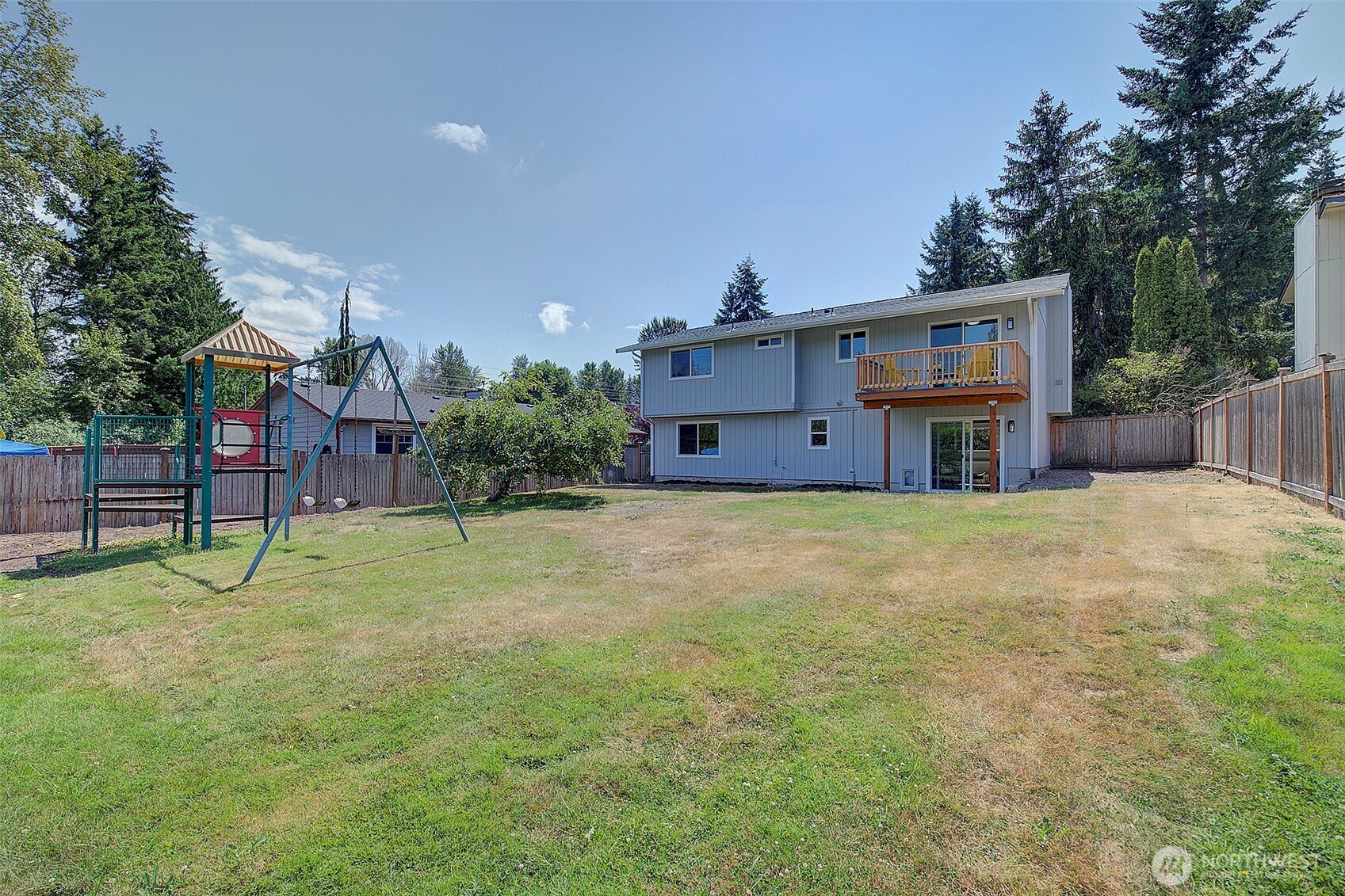 2019 181st Street Southeast Bothell, WA 98012 - Photo 22 of 23 a house view with a play ground in front of it