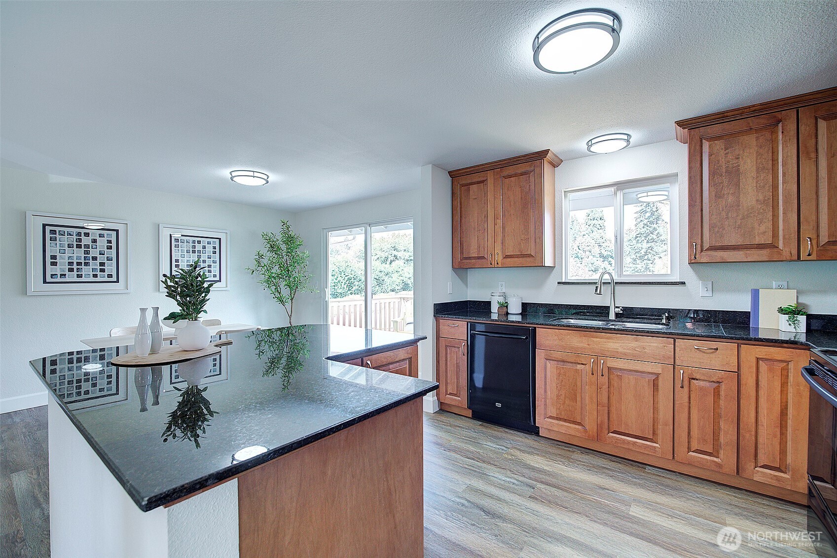 2019 181st Street Southeast Bothell, WA 98012 - Photo 8 of 23 a kitchen with granite countertop a sink cabinets and window