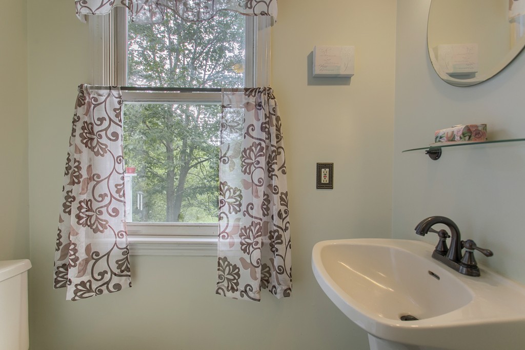 171 Northwest Road Spencer, MA 01562 - Photo 13 of 30 a bathroom with a sink and a mirror