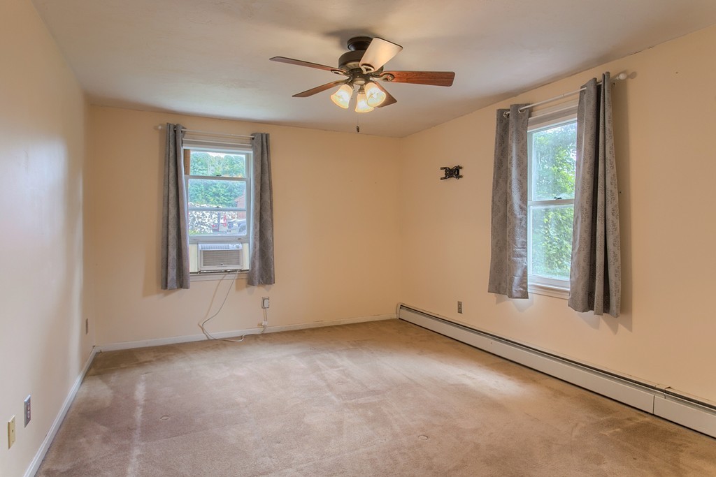 171 Northwest Road Spencer, MA 01562 - Photo 16 of 30 an empty room with windows and fan
