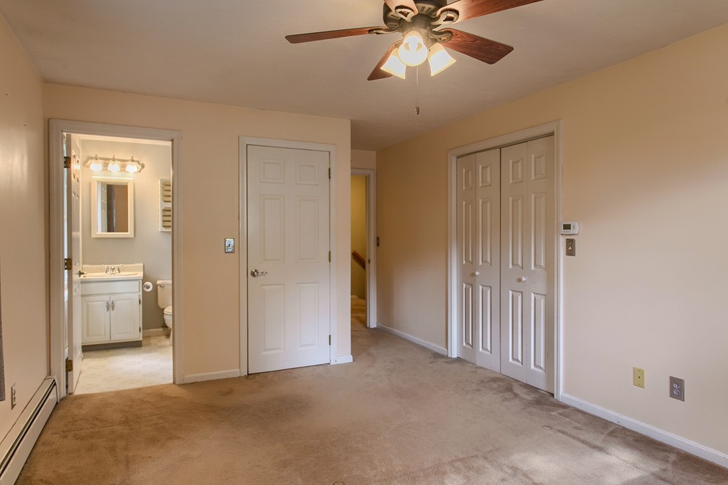 171 Northwest Road Spencer, MA 01562 - Photo 18 of 30 a view of a room with a chandelier fan and a livingroom