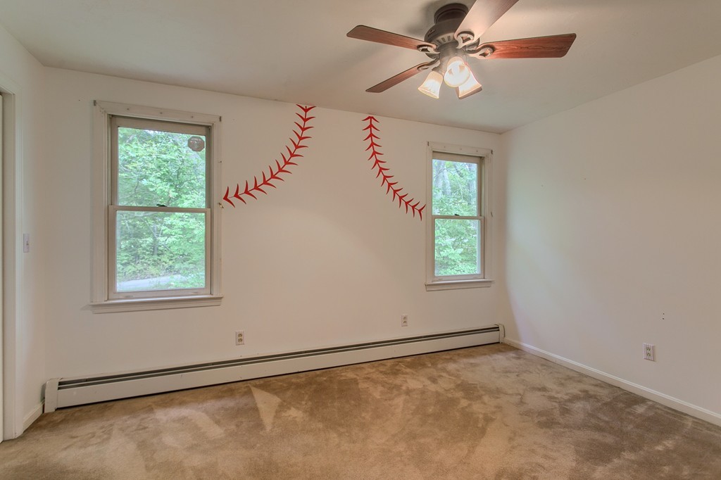 171 Northwest Road Spencer, MA 01562 - Photo 20 of 30 an empty room with windows and fan