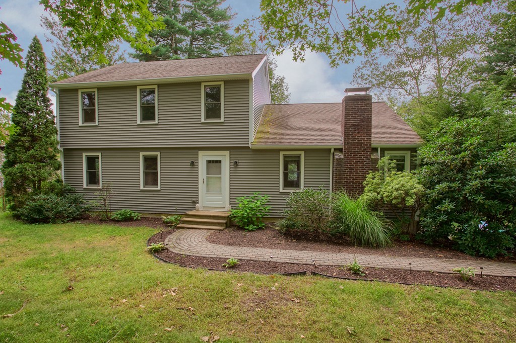 171 Northwest Road Spencer, MA 01562 - Photo 2 of 30 a front view of a house with garden