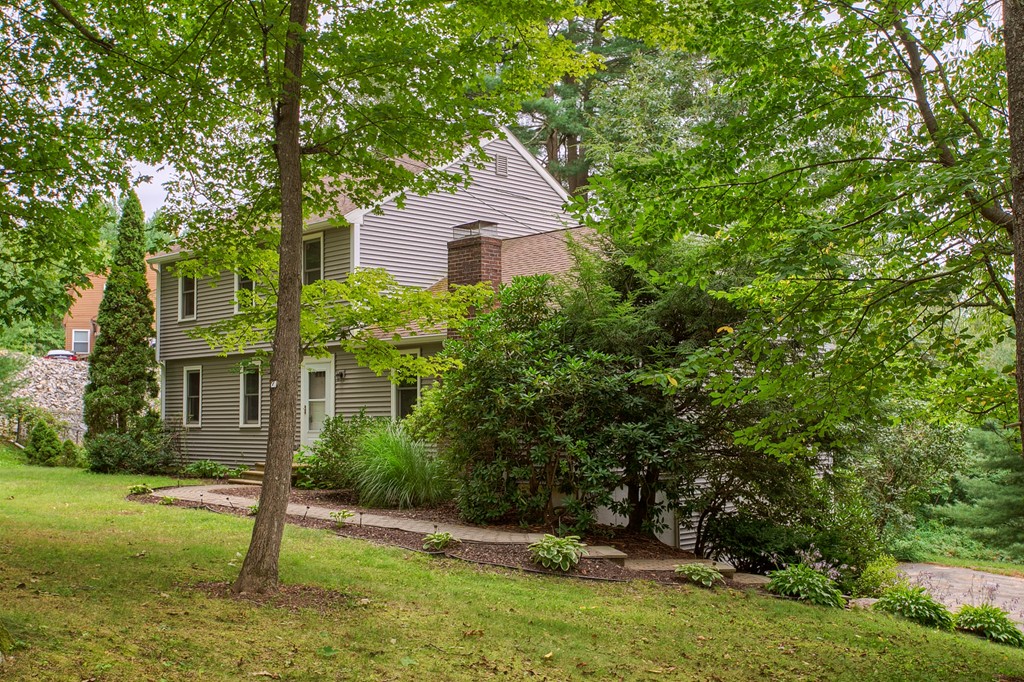 171 Northwest Road Spencer, MA 01562 - Photo 25 of 30 front view of a house with a yard