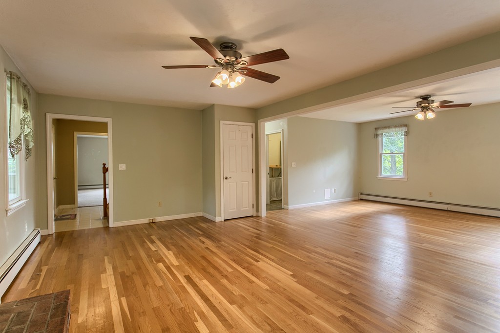 171 Northwest Road Spencer, MA 01562 - Photo 4 of 30 a view of empty room with wooden floor and fan