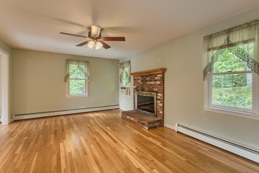 171 Northwest Road Spencer, MA 01562 - Photo 6 of 30 wooden floor in an empty room with a window