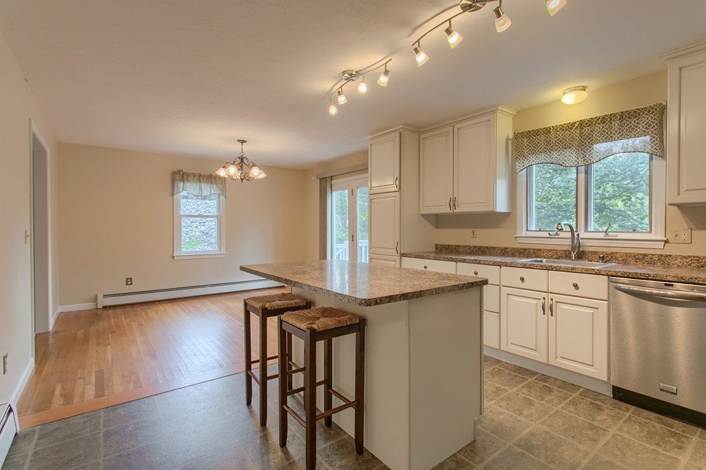 171 Northwest Road Spencer, MA 01562 - Photo 10 of 30 a kitchen with stainless steel appliances granite countertop a sink and a stove