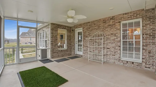 a view of an empty room with a balcony