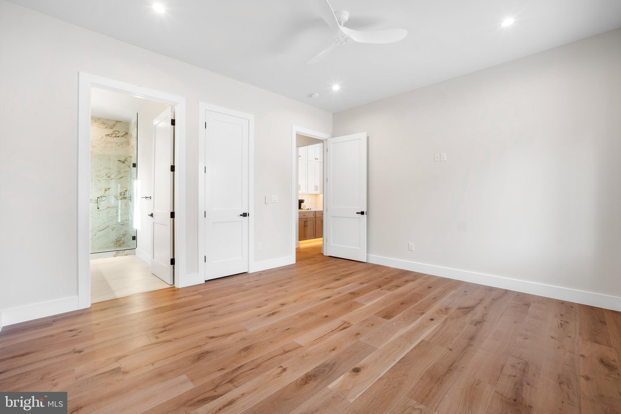 1935 Foxhall Road McLean, VA 22101 - Photo 20 of 80 a view of an empty room with wooden floor